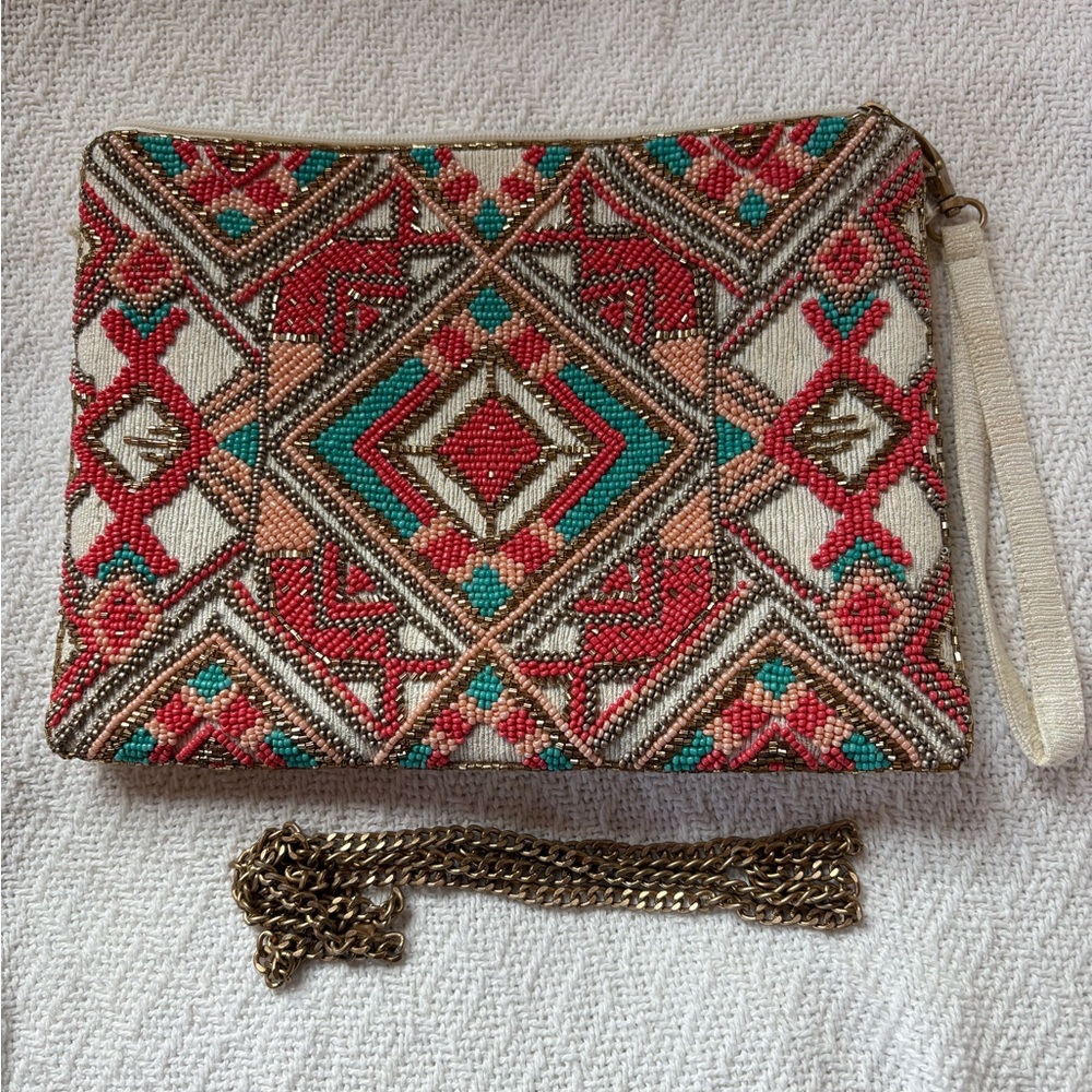Striking beaded clutch handbag in coral, turquoise and gold.